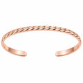 Braccialetto rigido aperto intrecciato in oro rosa elegante